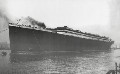 RMS Titanic Launched: Titanic afloat for the first time, but without engines, boilers, machinery and fittings, 31 May 1911 by English Photographer